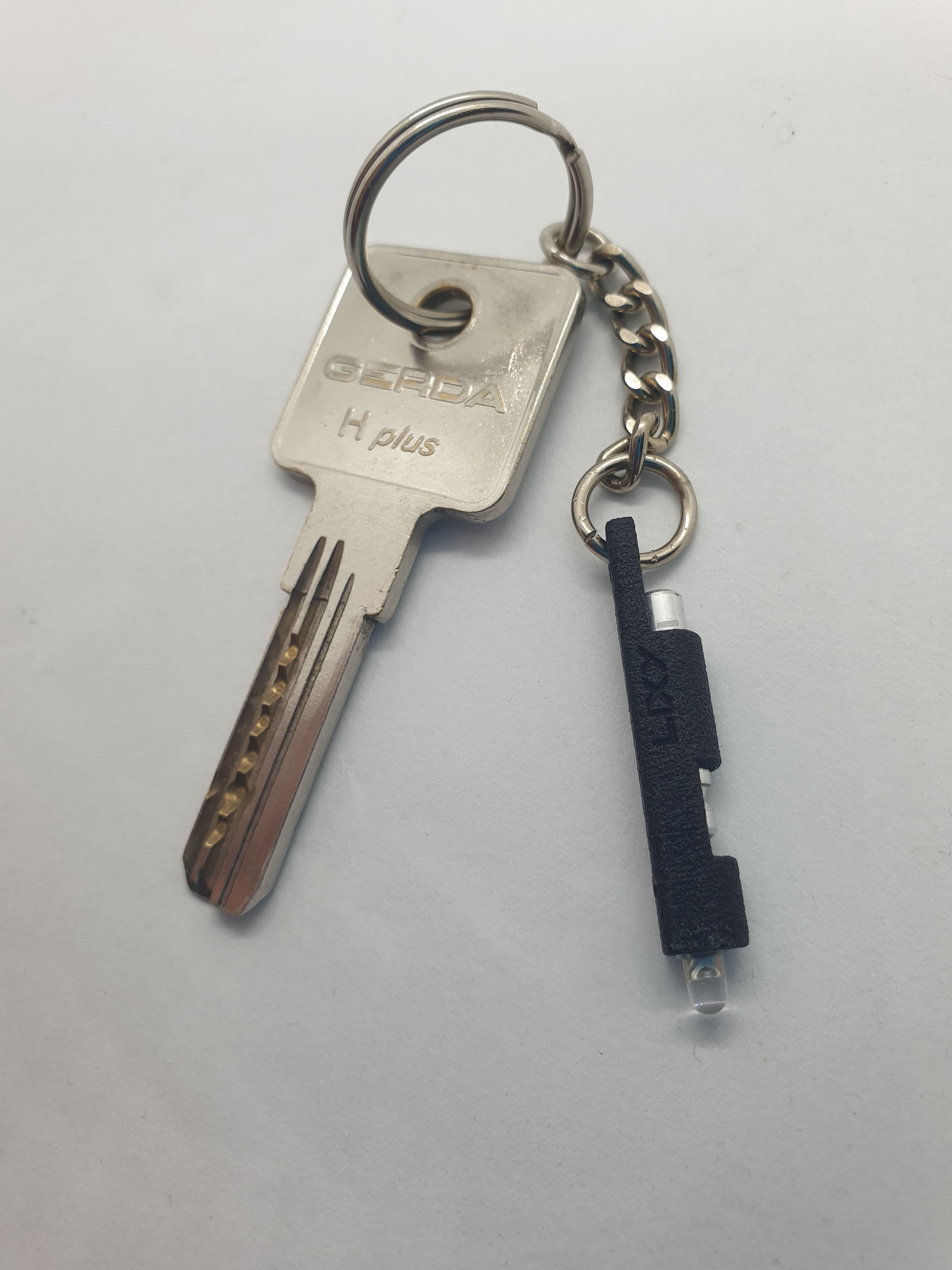 LIXY World Smallest Micro Nano Flashlight for keychain
